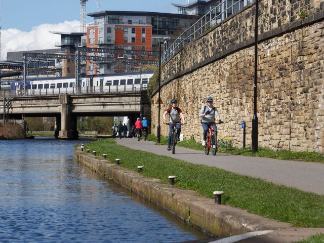 Cyclists in Leeds on a shared footpath